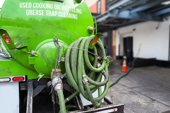 commercial kitchen grease trap being pumped out in Leesburg